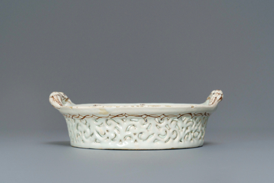 A polychrome Brussels faience '&agrave; la haie fleurie' reticulated basket, 18th C.